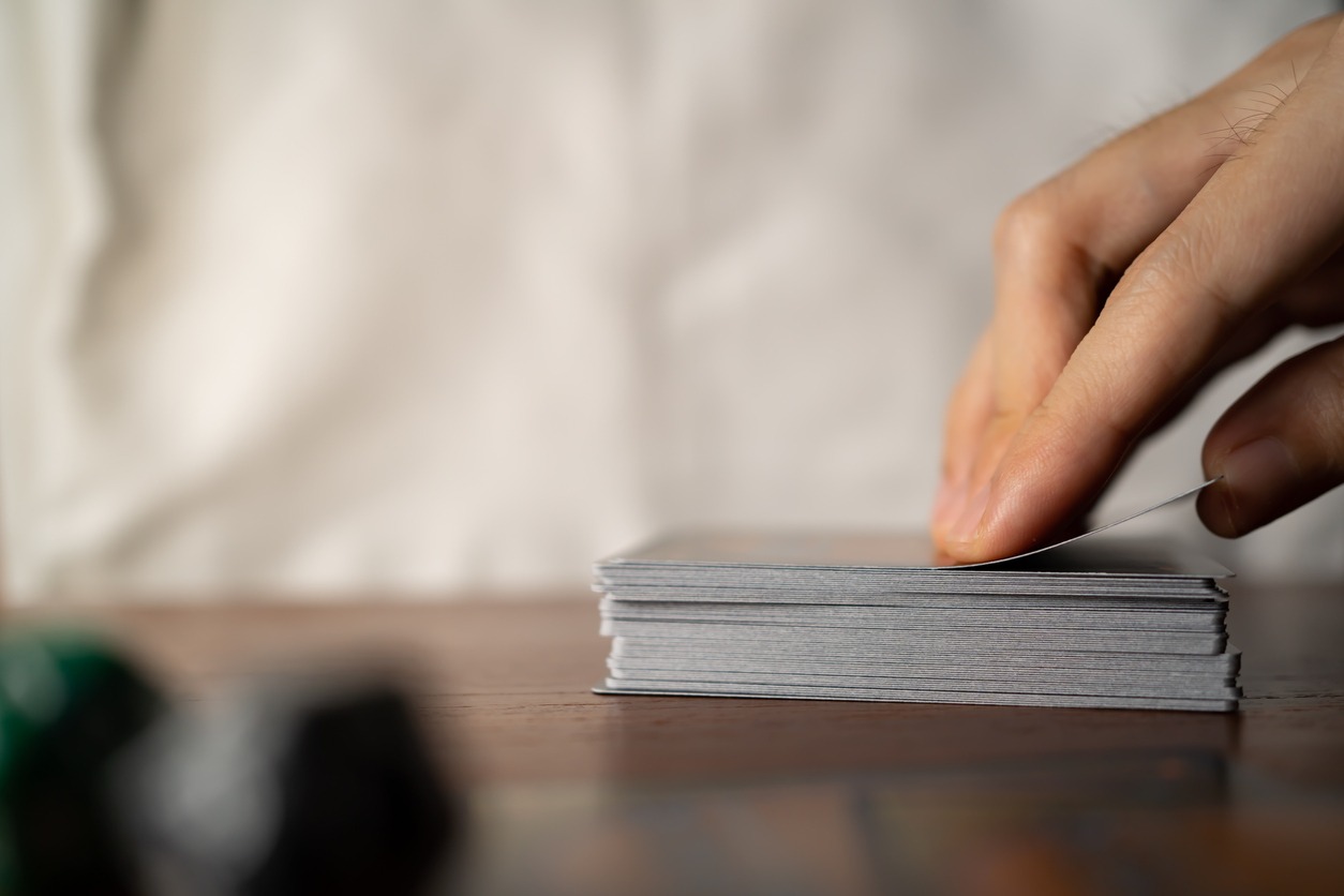 Draw trading cards from the deck