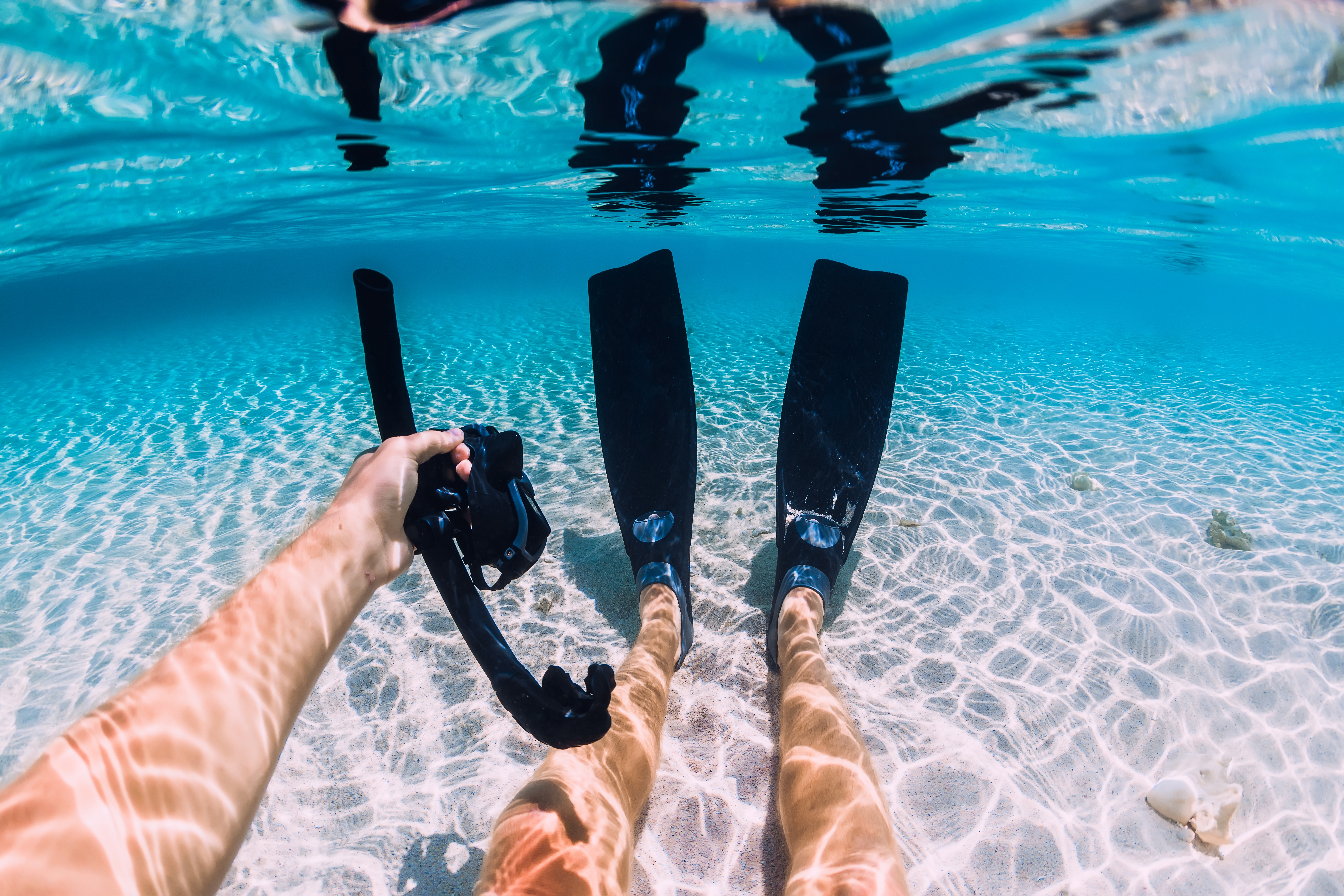 Snorkeler relax with fins