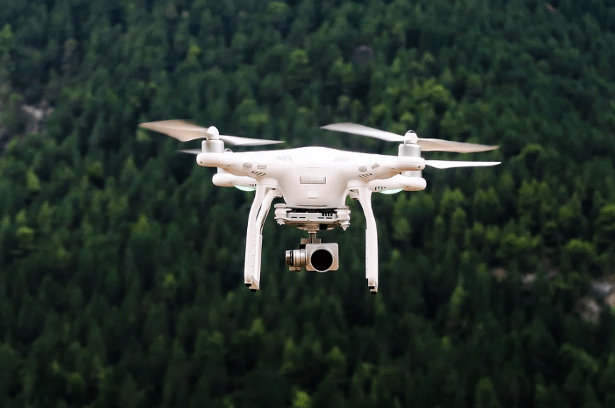 a-flying-drone-with-a-camera-mounted-to-it