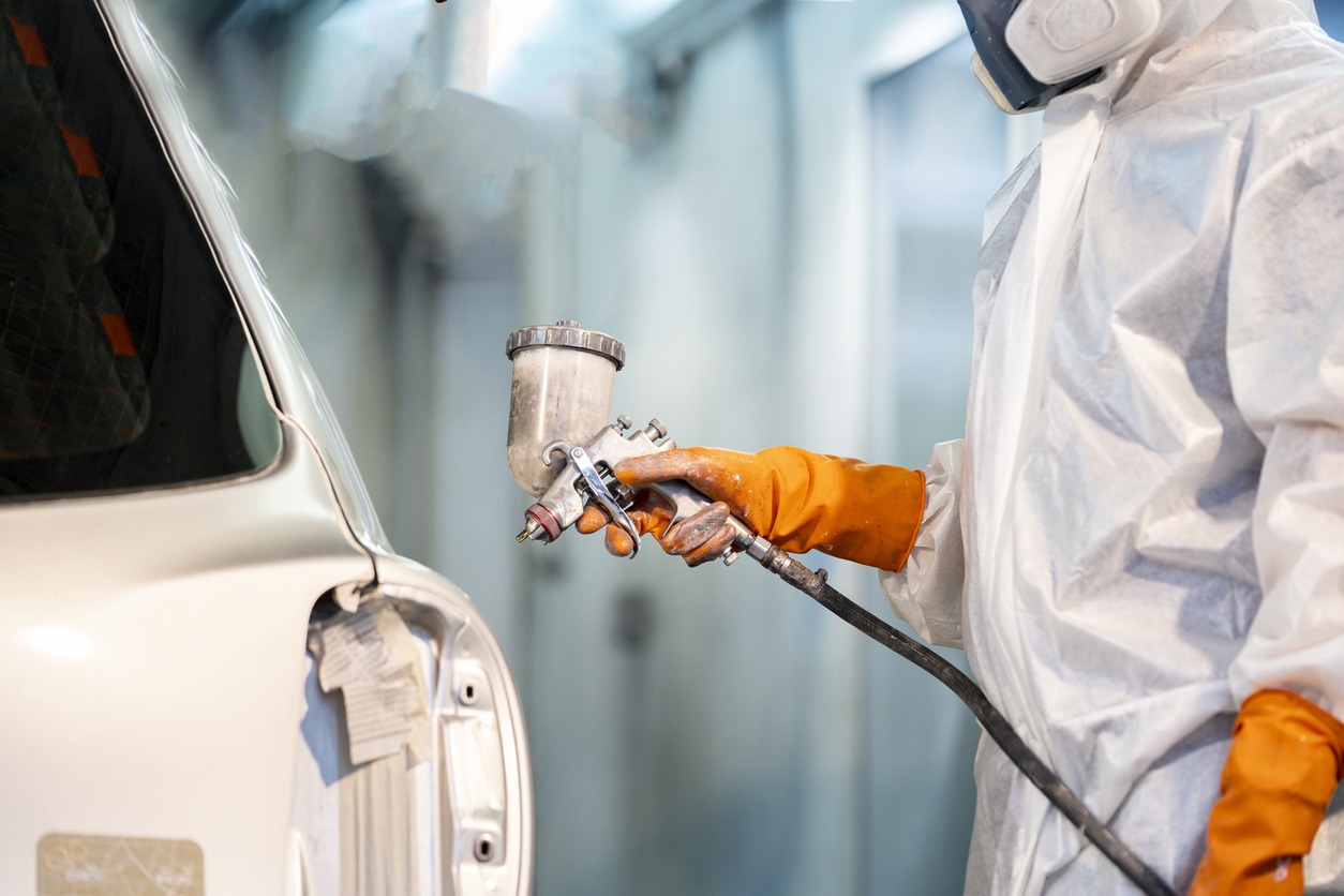 a-man-airbrushing-and-painting-car-body