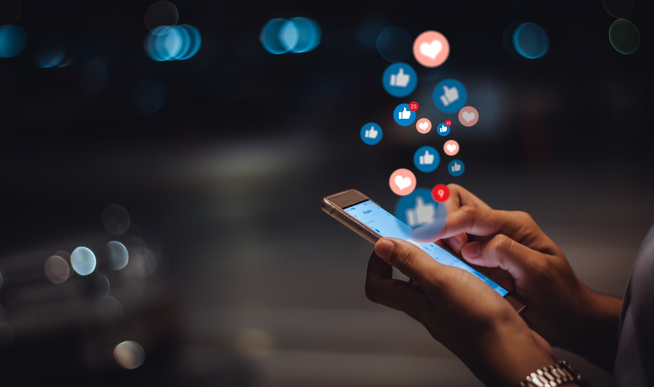 a woman using social media on her smartphone