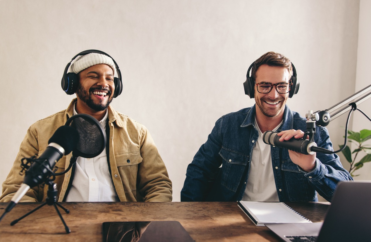 two men having a great time on a podcast