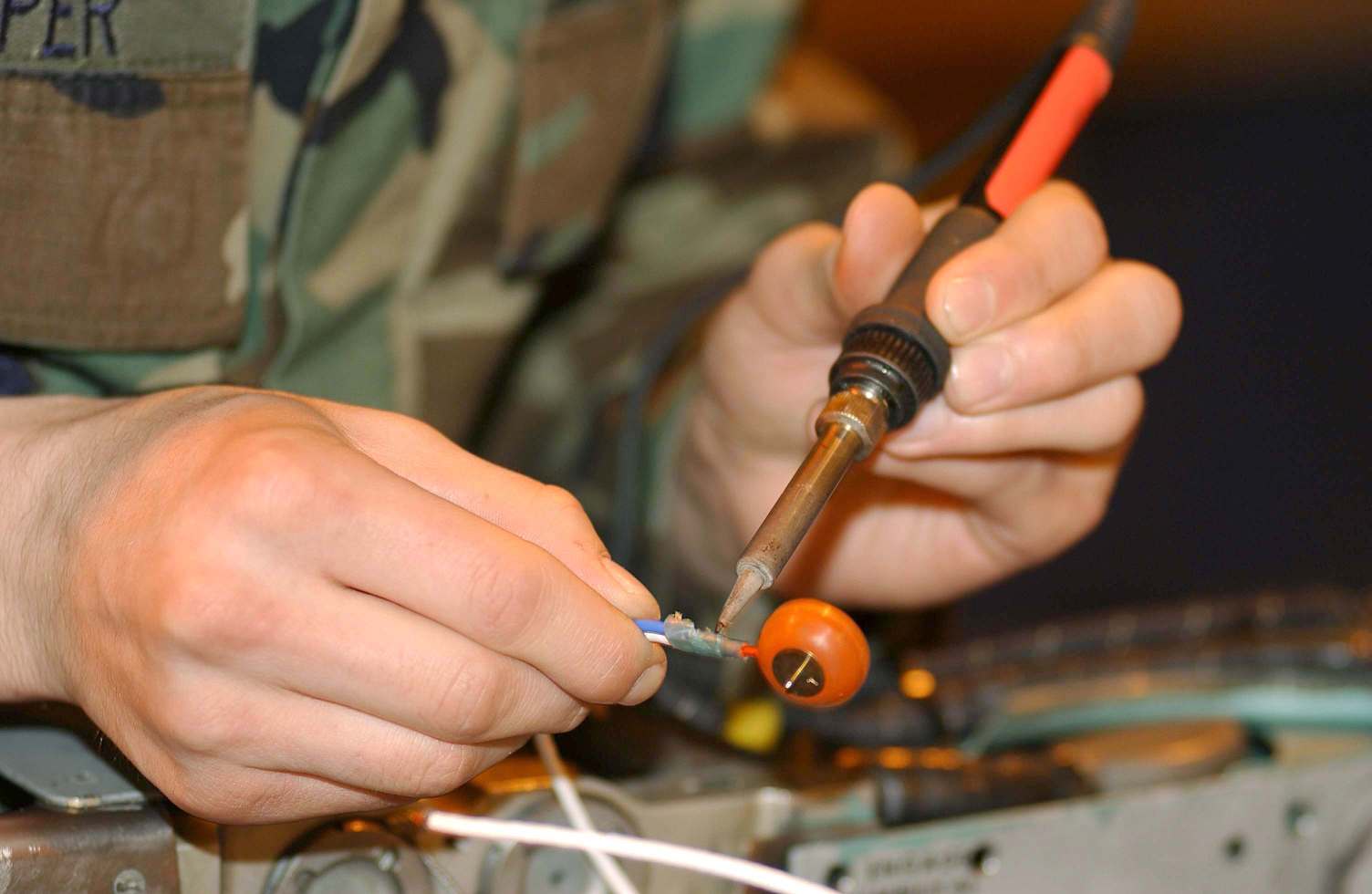 Desoldering a contact from a wire