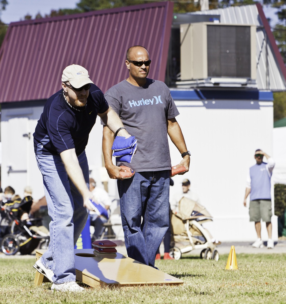 Men Playing Cornhole