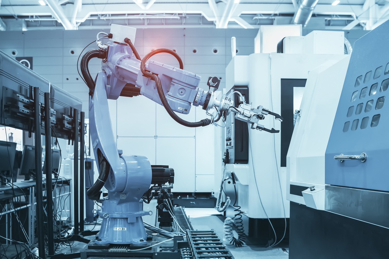 an automatic robot arm in an industrial setup