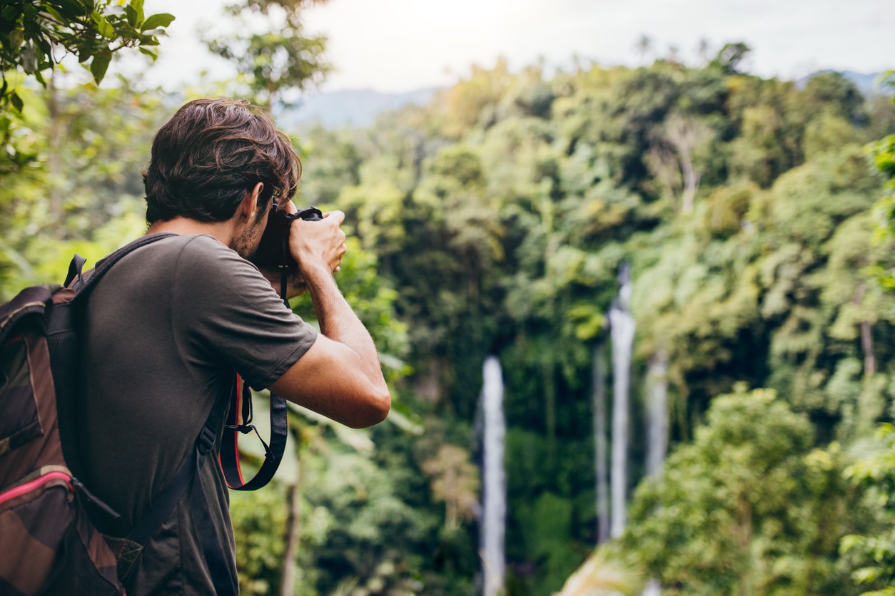 photographer in forest