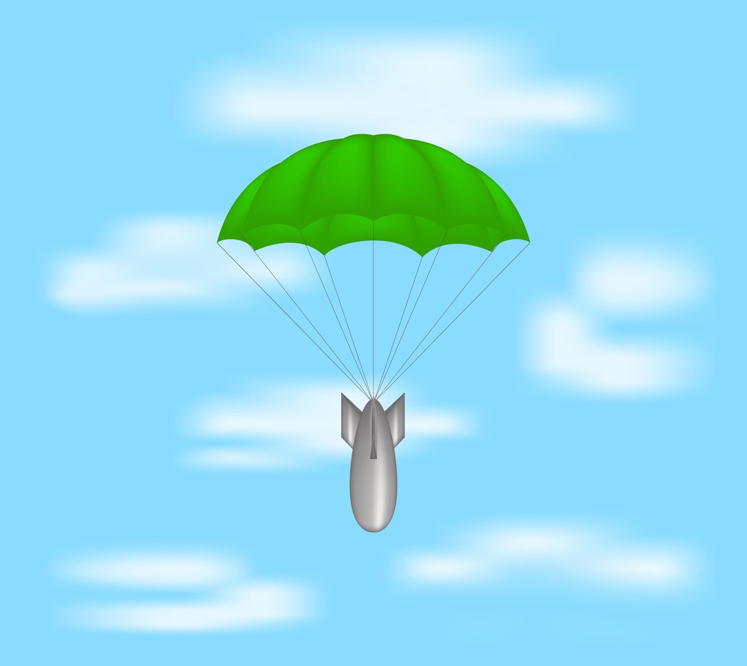 A green parachute attached to a rocket descending