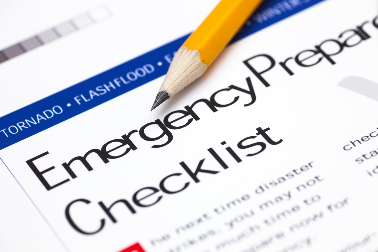 Emergency Preparedness Checklist with a pencil. Close-up