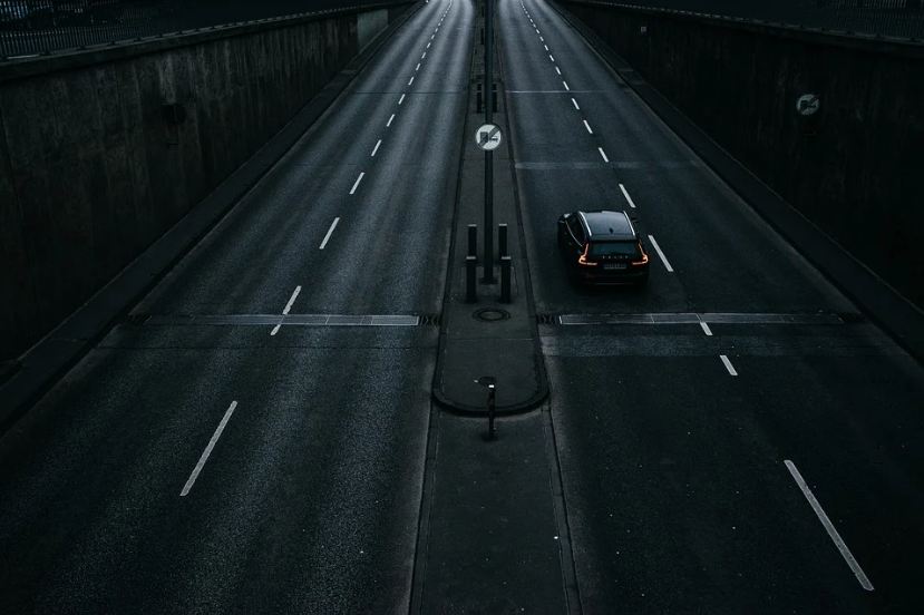 Picture of a car on the road. 