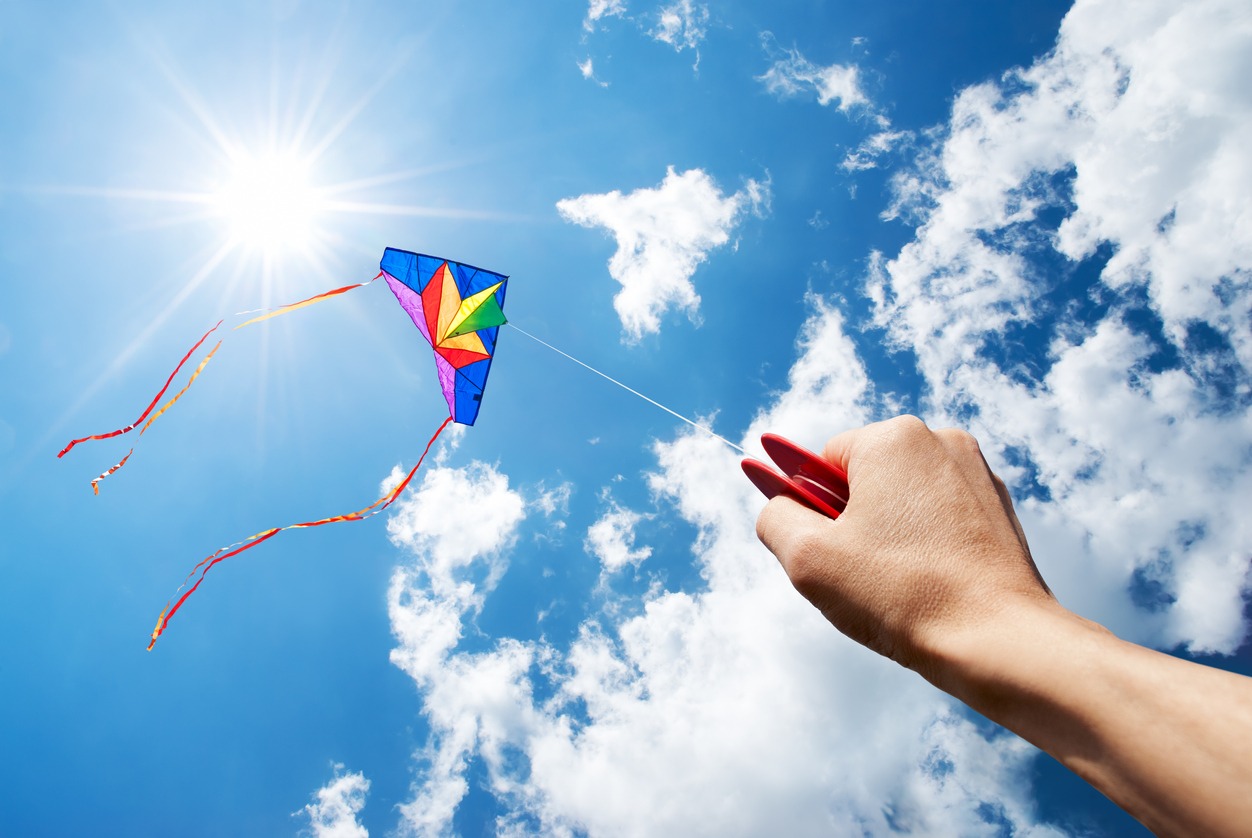 man flying a kite