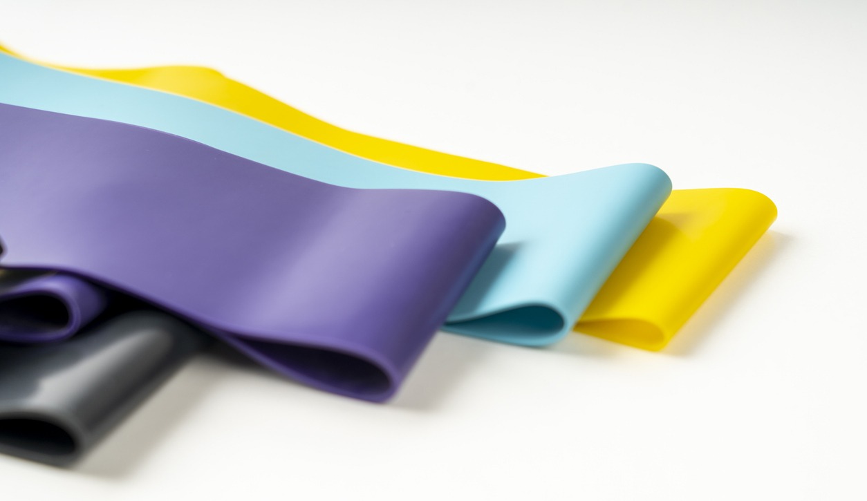 A collection of vibrant elastic workout bands.
