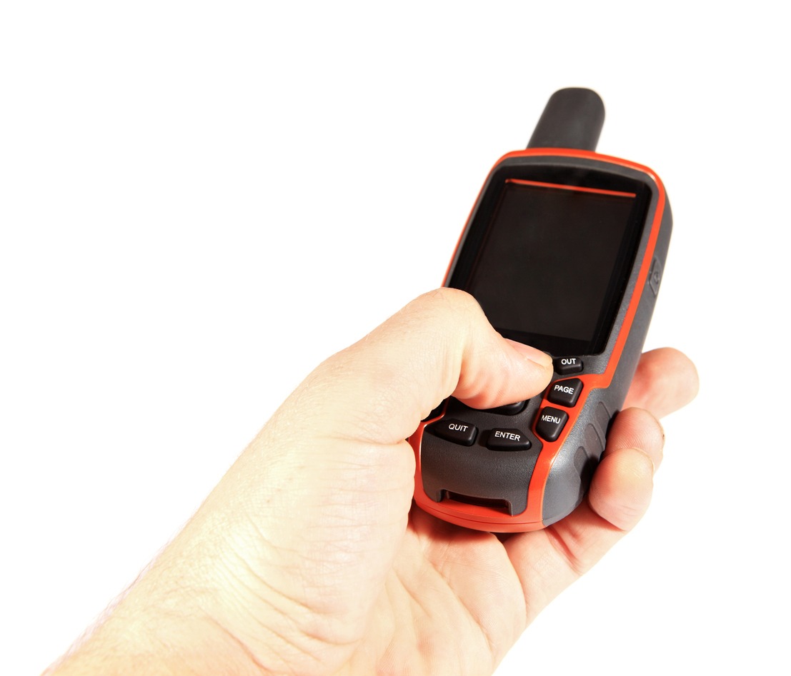 A man operating a GPS device.