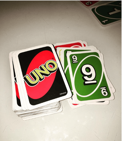 A stack of Uno cards and a discard pile for playing Uno