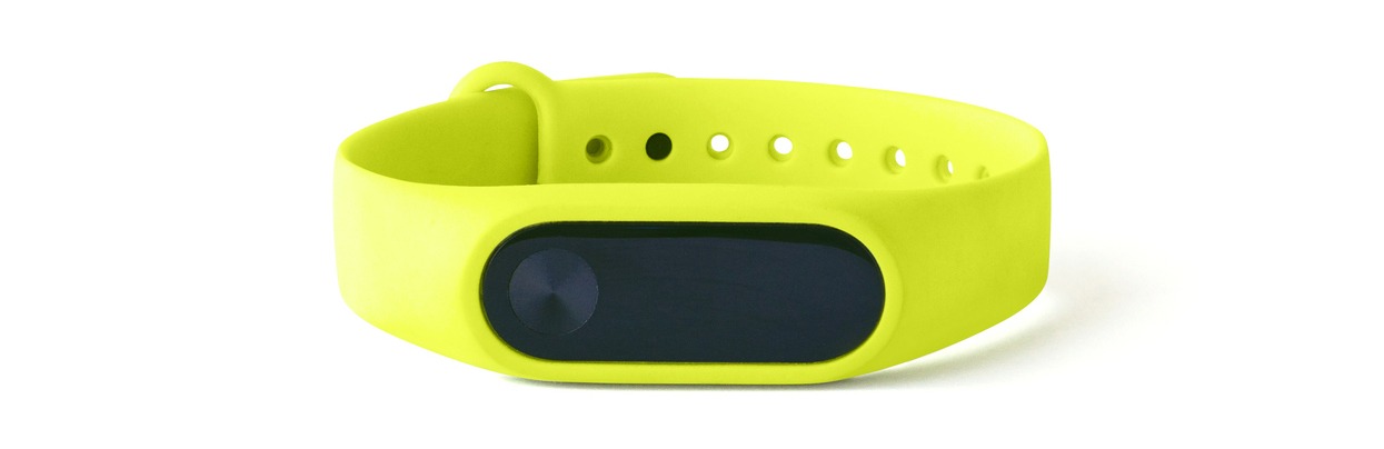 An isolated fitness bracelet or tracker is shown against a white background.