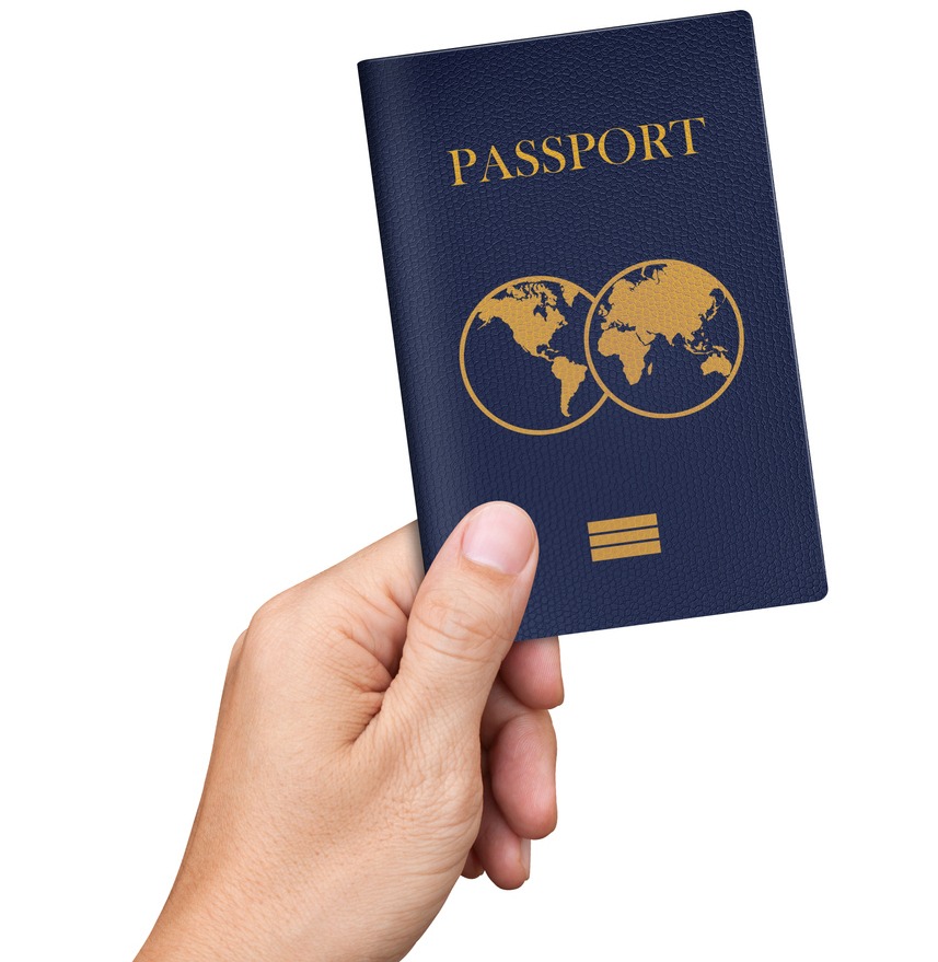 Blue passport in hand, isolated on white background