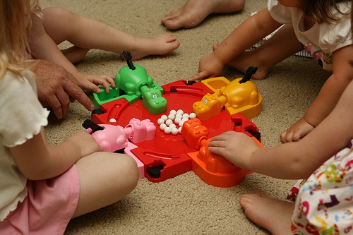 Hungry hippos being played by four kids