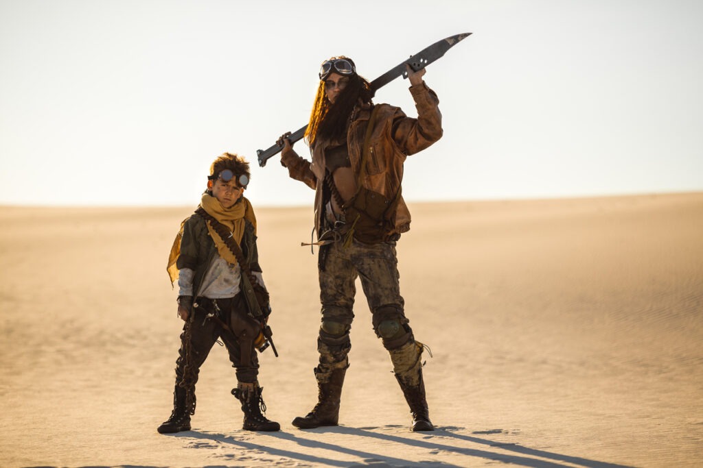 Post-apocalyptic Woman and Boy Outdoors
