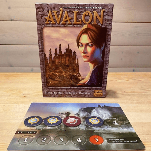 The Resistance: Avalon game box, tokens, and board