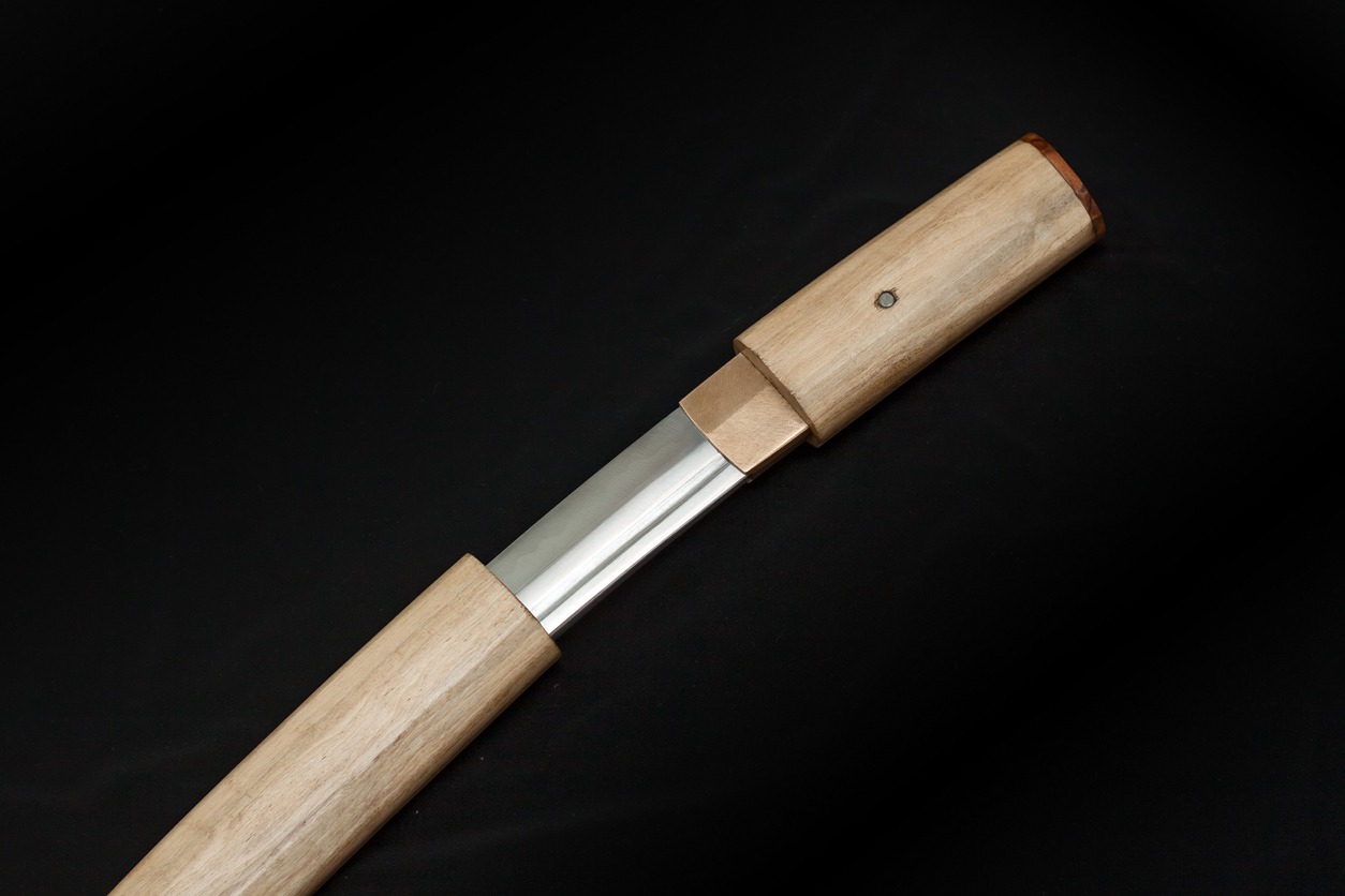 Tanto blade in shirasaya scabbard. Japanese ethnic style