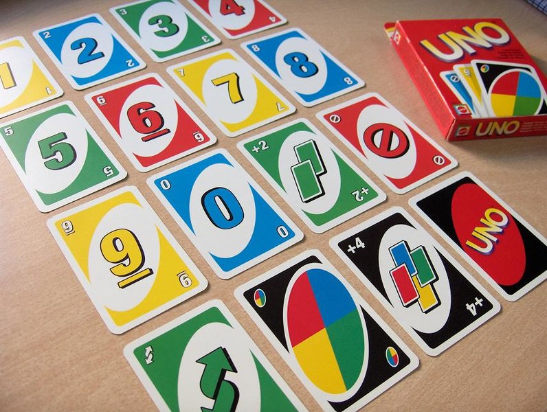 Various Uno cards on a table
