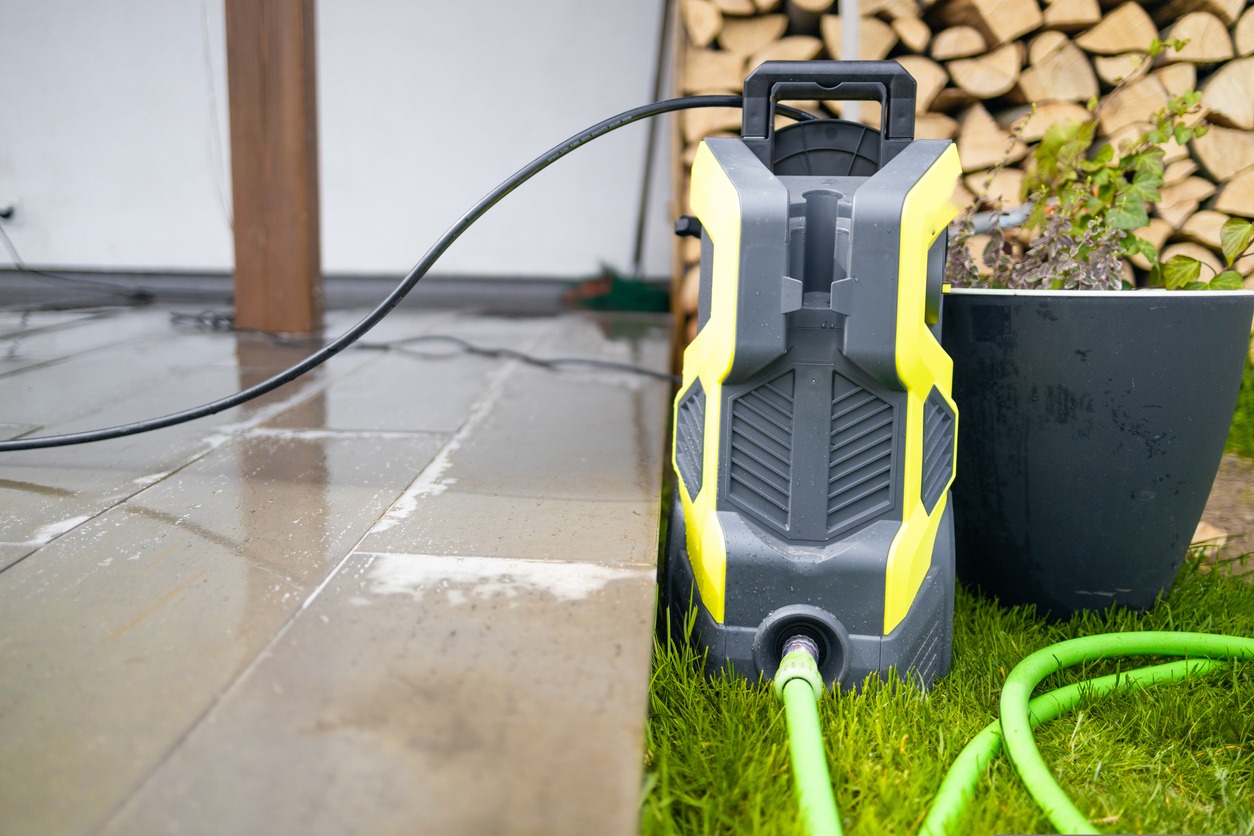 A yellow and gray electric pressure washer
