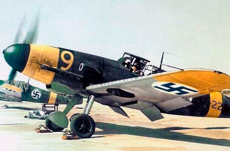 a Bf 109 fighter plane in an airport
