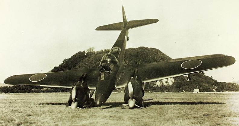 a wrecked Nakajima J1N1 Gekko on an airfield