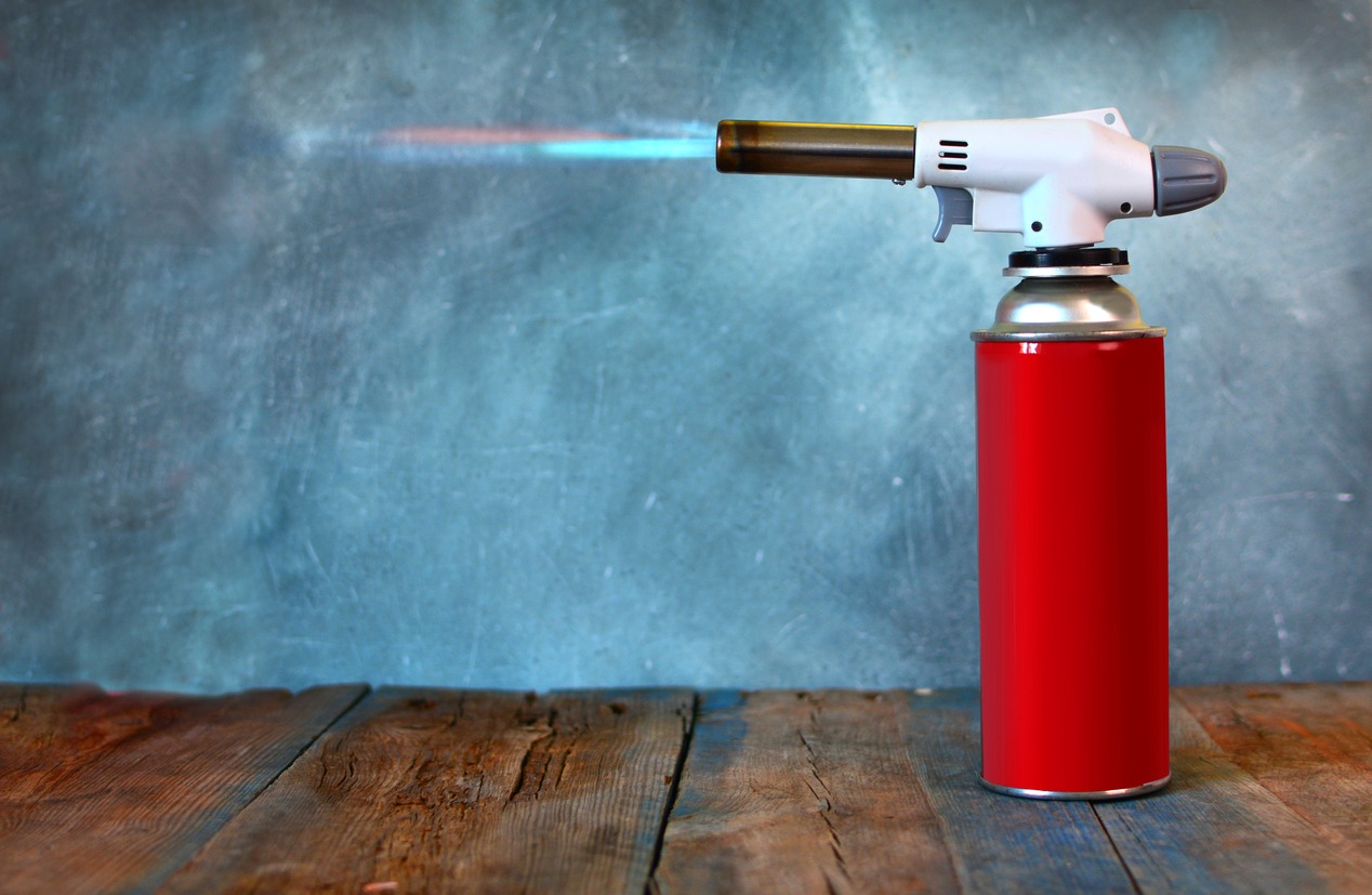 household gas cylinder with a butane torch