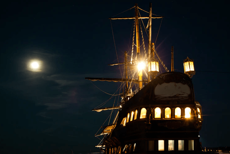 A-boat-in-the-sea-during-night-time