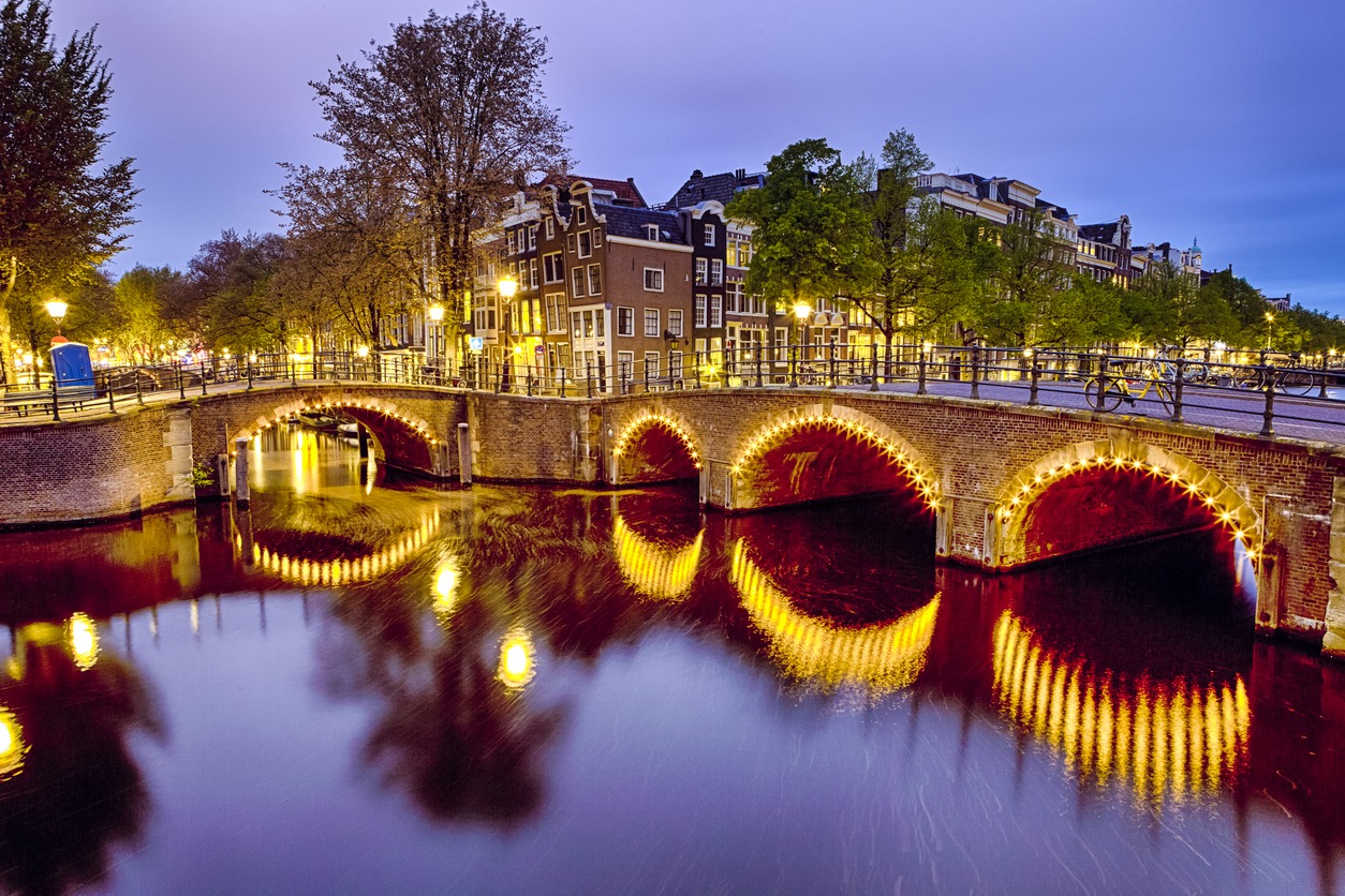 A long exposure shot of a canal in Amsterdam, the Netherlands.