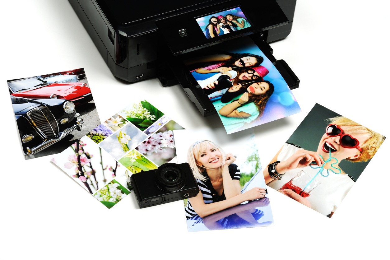 A printer printing multiple pictures