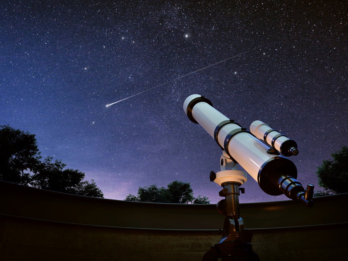 A refractor telescope positioned to watch a falling star.