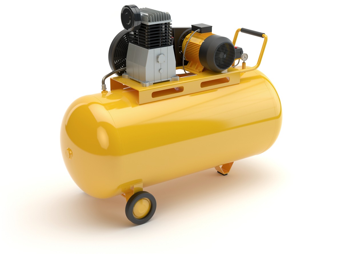 A small yellow air compressor