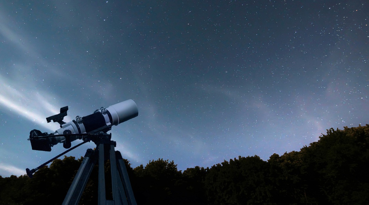 A telescope positioned to view the sky.