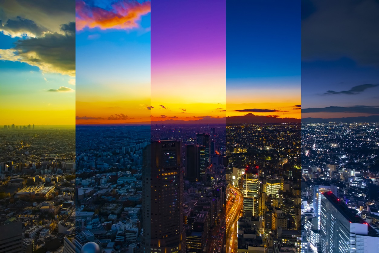 An aerial view of Tokyo during five different times of day.