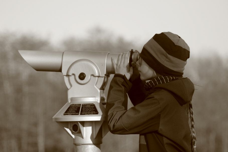 a-child-looking-through-a-telescope