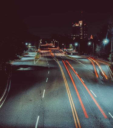 a-long-exposure-photo-of-a-road