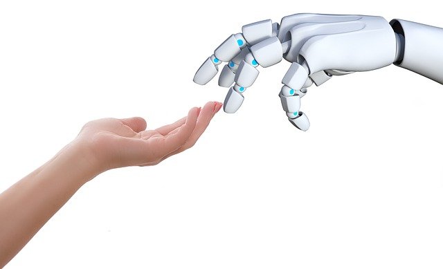 human-hand-touching-a-digital-robots-hand