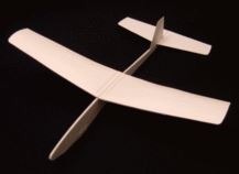paper airplane secured with glue