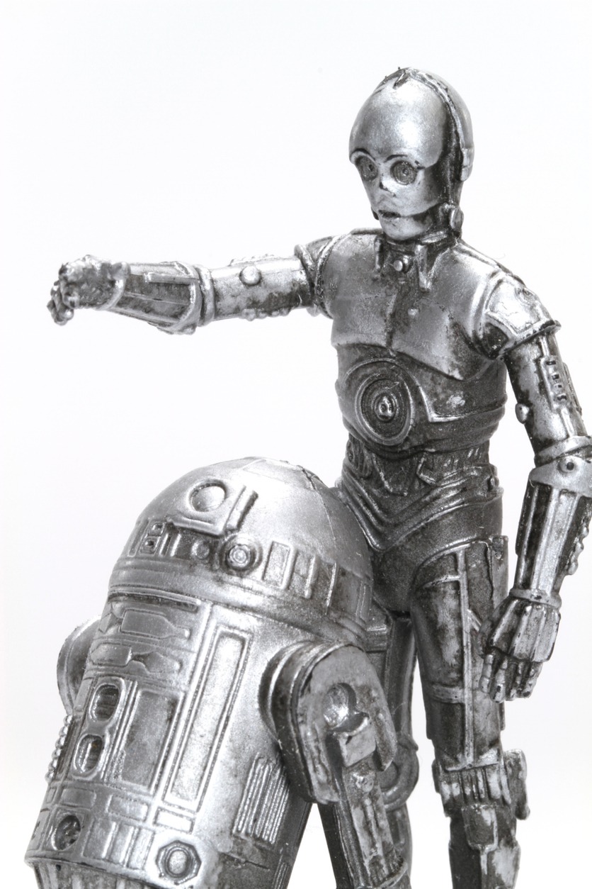 portrait of R2-D2 and C-3P0 action figures