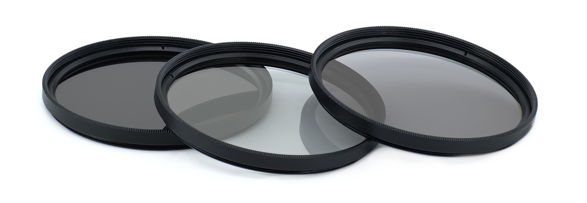 three neutral density filters on a white background