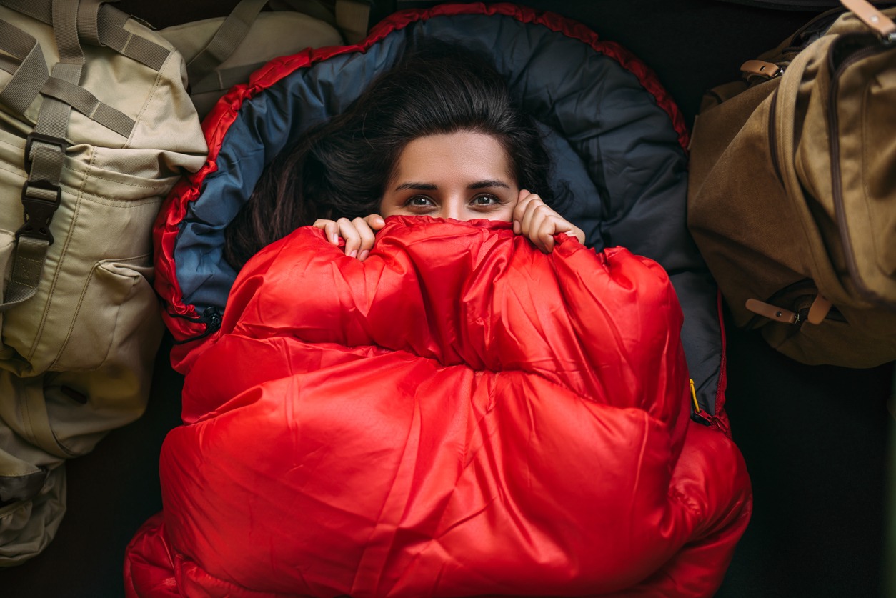 A woman in a comfortable sleeping bag
