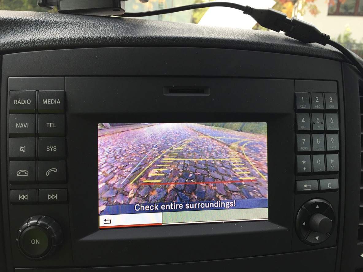 Car screen showing parking guidelines