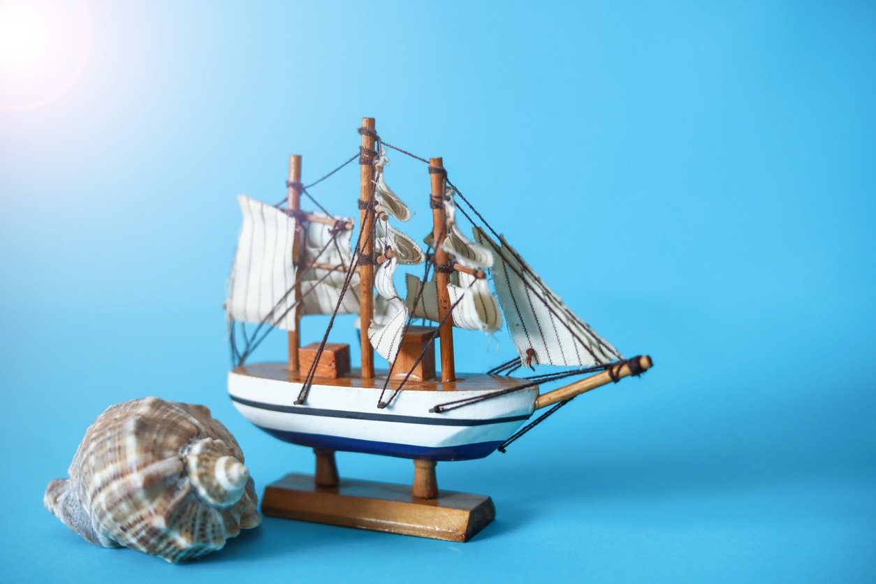 Sea Shell And Toy Ship Model