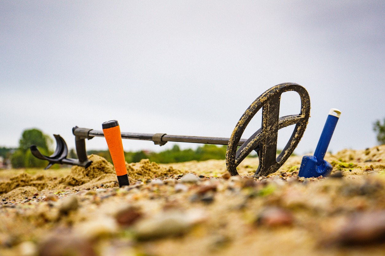 metal detector with accessories on the beach