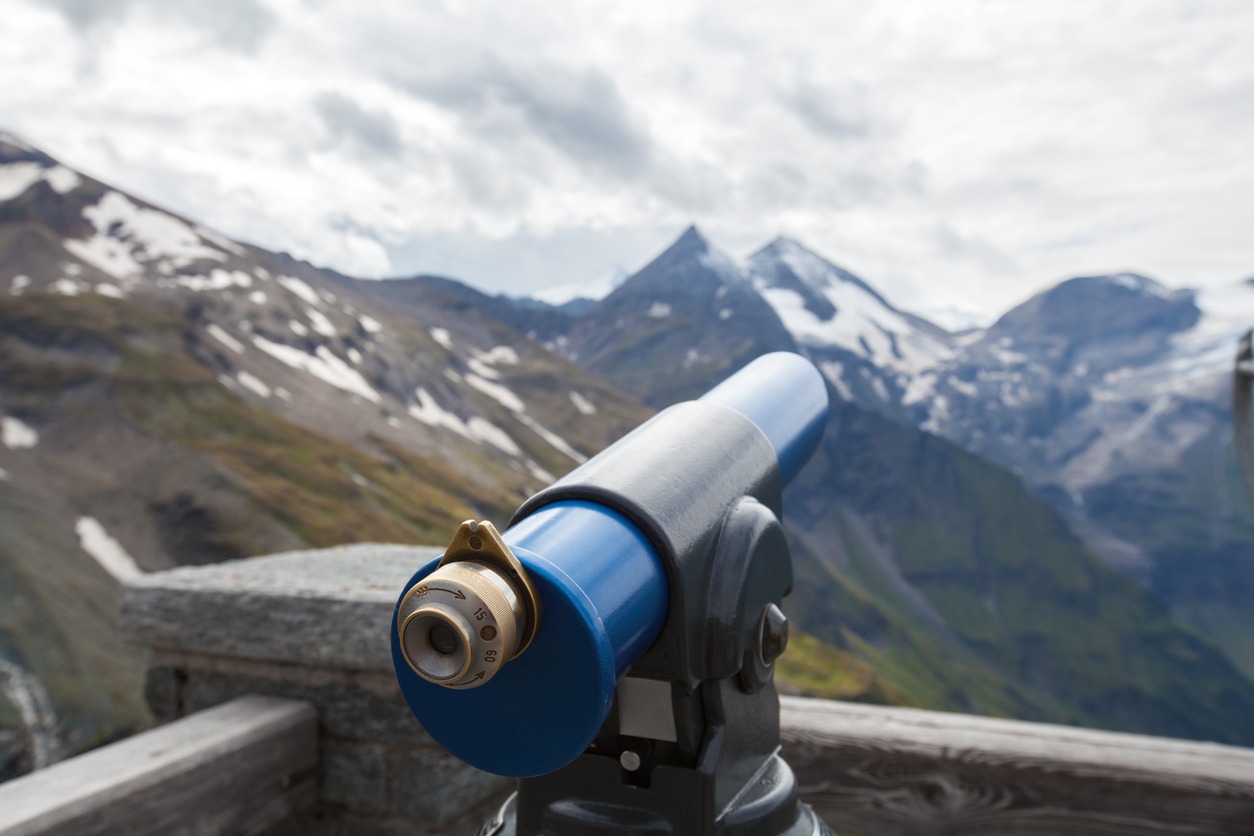 looking at mountains with a telescope