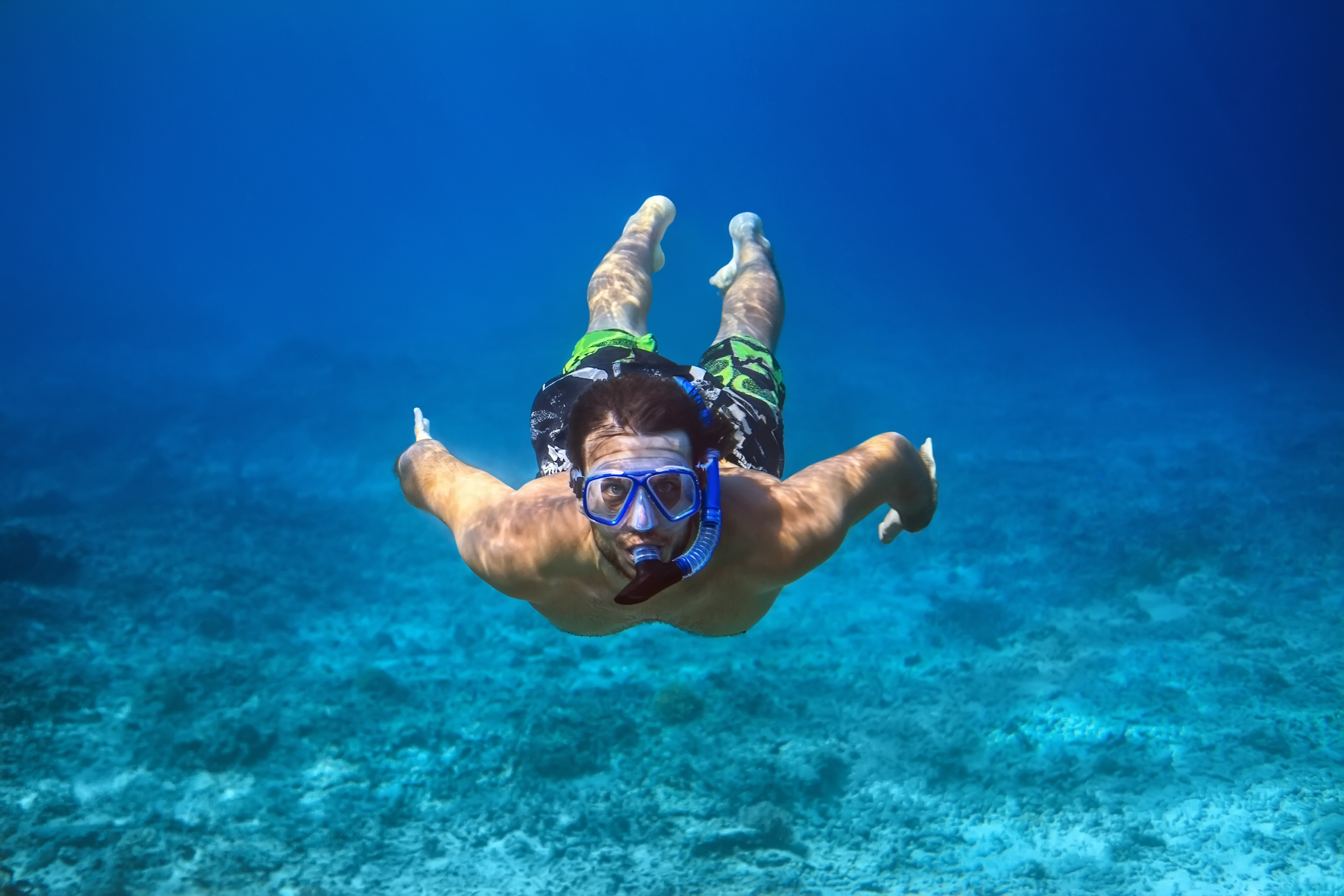 man wearing snorkeling mask
