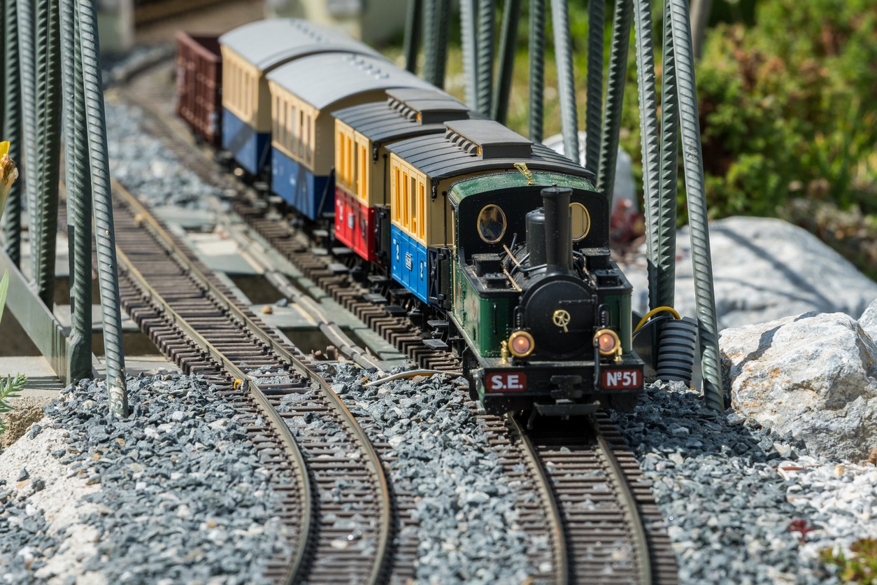 An outdoor setup of a railway model train.