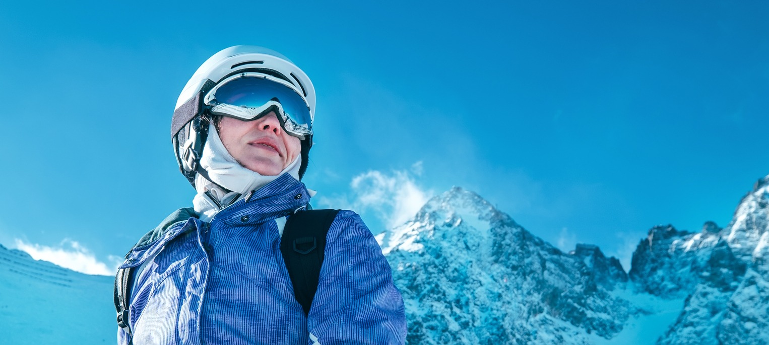 a woman wearing snow goggles