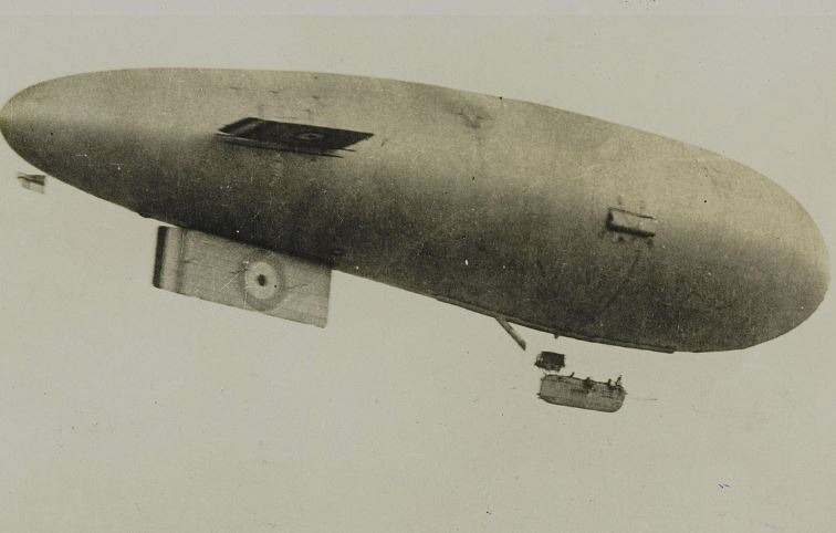 A British dirigible moving along the coast